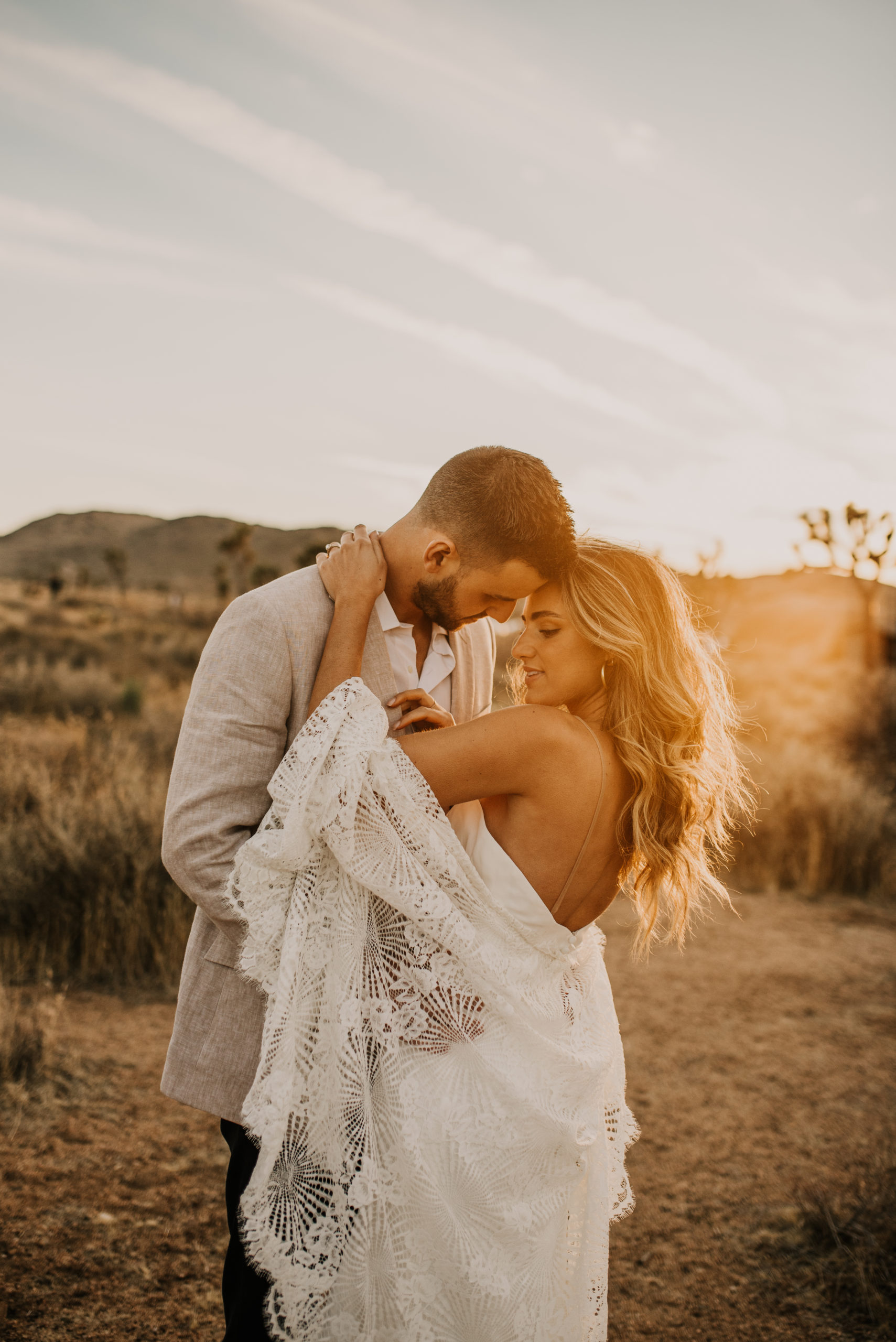 bride and groom in joshua tree national park