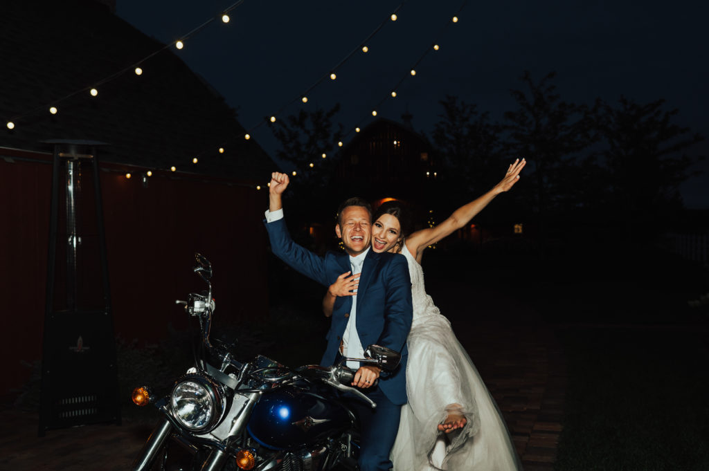 bride and groom on motorcycle Iowa wedding photographer