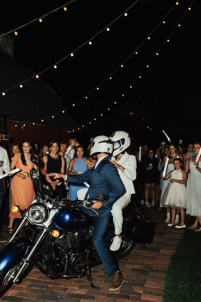 bride and groom on motorcycle photos