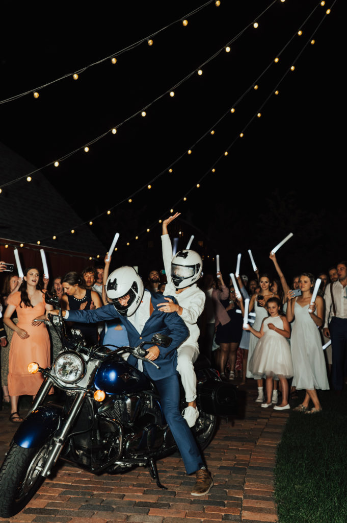 Unique Motorcycle Wedding Exit bride and groom